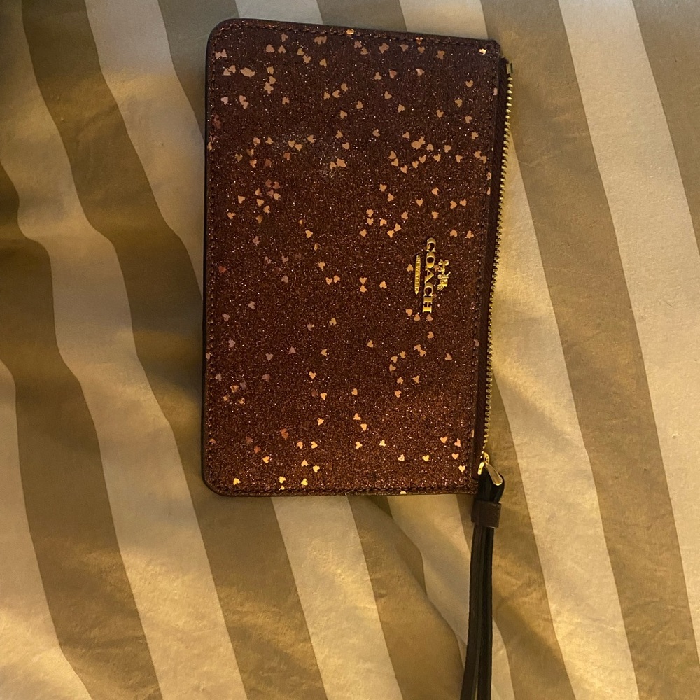 Purple sparkly coach wristlet